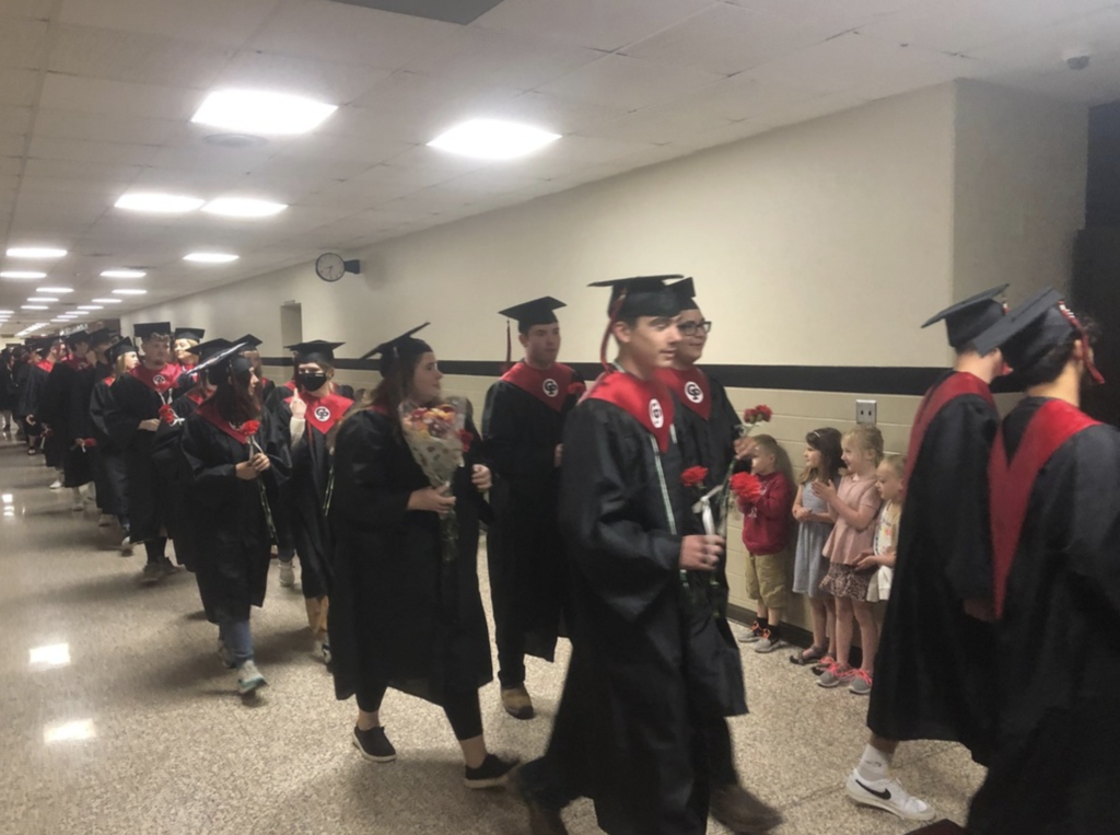Seniors walking through the hallway
